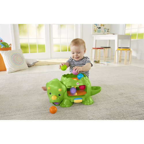 купить Игрушка  Fisher Price Динозавр с шариками