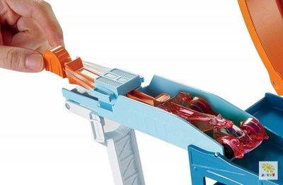 купить Автовоз-трансформер Трюки и Гонки на 19 машин DWN56